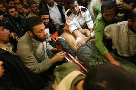  A wounded Hamas militant is brought to Nasser hospital in southern Gaza Strip on Nov. 5, 2008.