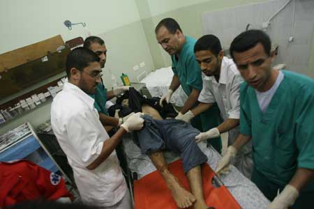 Doctors try to save a wounded Hamas fighter at Nasser hospital in southern Gaza Strip on Nov. 5, 2008.