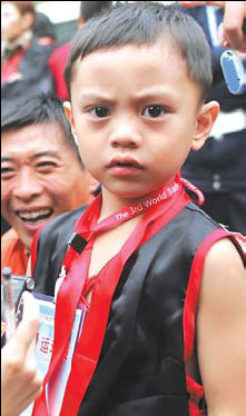 4, was the youngest medalist at the World Traditional Wushu Championships. [China Daily]