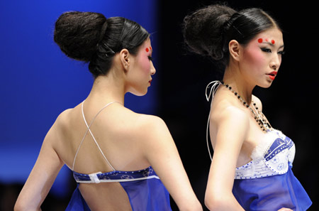 Models present creations of Ordifen during the Ordifen Cup 2008 Lingerie Innovative Design Contest at China Fashion Week in Beijing, Nov. 5, 2008.