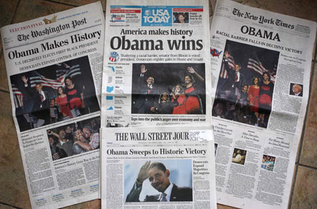 Photo shows the front pages of 'USA Today', 'The Washington Post', 'The New York Times', and 'The Wall Street Journal'. After Barack Obama was elected to be next U.S. president, U.S. media published photos and articles of the historic event on their front pages. [Xinhua]