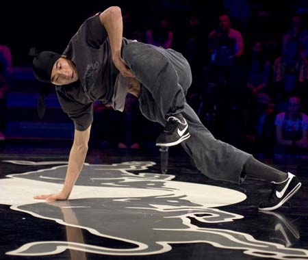 Wing of South Korea performs during the Red Bull BC One break-dance competition, in which 16 B-Boys from across the world compete in one-on-one knockout battles to determine the winner, in Paris November 5, 2008. The competition, which is in its fifth year, was won by Wing over Taisuke of Japan in the final. 