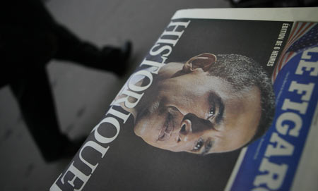 Photo taken on Nov. 5, 2008 shows the front page of 'Le Figaro' with news of Barack Obama being elected to be the next U.S. president on a newsstand in Paris, France. French public showed great concern for Tuesday's U.S. election, and the French media put the news of the U.S. election on their front pages. [Xinhua]