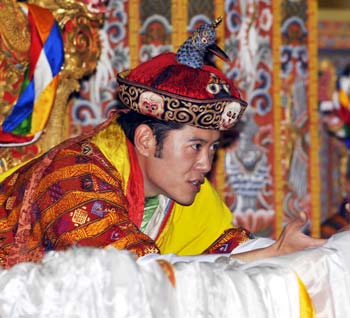 The fifth king of Bhutan, Jigme Khesar Namgyel Wangchuck receives blessings at the coronation ceremony in Thimphu, Bhutan, Nov. 6, 2008. The fifth king of Bhutan, Jigme Khesar Namgyel Wangchuck was adorned with crown at the coronation ceremony Thursday. The Oxford educated 28-year-old Jigme Khesar Namgyel Wangchuck became the world's youngest reigning monarch after the coronation. 