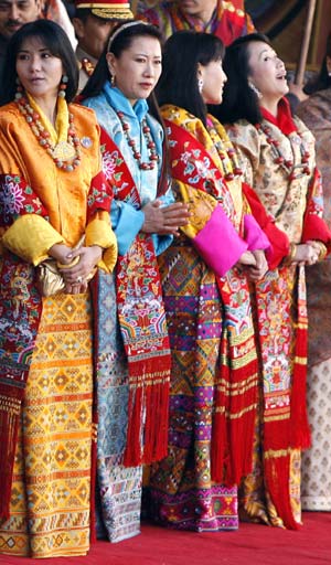 (L-R) Bhutan's Queen Ashi Sangay Choden, Queen Mother Tshering Yangdon, Queen Ashi Tshering Pem and Queen Ashi Dorji Wangmo attend the coronation ceremony of Bhutan's fifth King Jigme Khesar Namgyel Wangchuck inside Tashichhodzong Palace in Thimphu November 6, 2008. [Xinhua/Reuters]