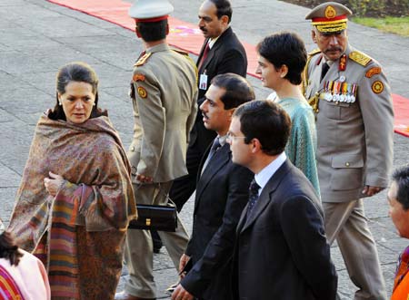 Sonia Gandhi (1st L), chief of India's ruling Congress Party, arrives at the coronation ceremony with her family members in Thimphu, Bhutan, Nov. 6, 2008.