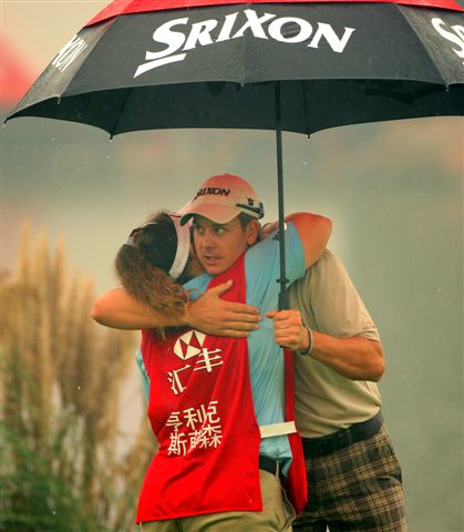 First round leader Henrik Stenson was grateful to get out of the rain. 