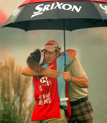  First round leader Henrik Stenson was grateful to get out of the rain.