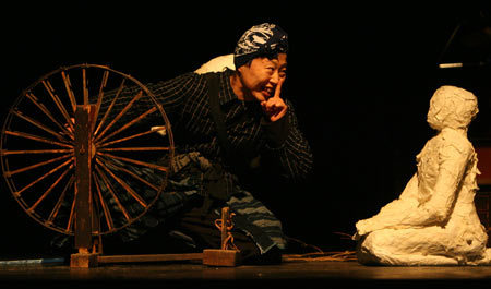An actor of the Japanese Bird Theatre Company performs in a drama of Sword Casting, adapted from a novel by Chinese literati Lu Xun, at the Grand Theatre in Zhangjiagang City, east China's Jiangsu Province, Nov. 4, 2008. The 3rd Yangtze Valley Drama Festival, coinciding the 15th China, ROK and Japan Triple Drama Art Festival, is staged from Nov. 2 to Nov. 12 at the Zhangjiagang City. [Xinhua photo]