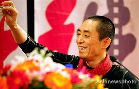 Acclaimed movie director Zhang Yimou gestures after accepting an invitation on Friday to receive an honorary doctorate from Boston University November 7, 2008. 
