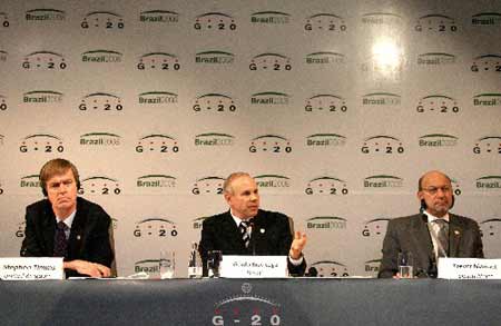 British Treasury Financial Secretary Stephen Timms, Brazilian Finance Minister Guido Mantega and Finance Minister of South Africa Trevor Manuel (from L to R) attend a press conference in Sao Paulo, Brazil, Nov. 9, 2008. The G-20 Finance Ministers and Central Bank Governers&apos; Meeting closed on Sunday. 