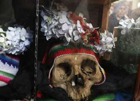 A skull is seen during a ceremony on the Day of Skulls at a church in the General Cemetery of La Paz November 8, 2008.
