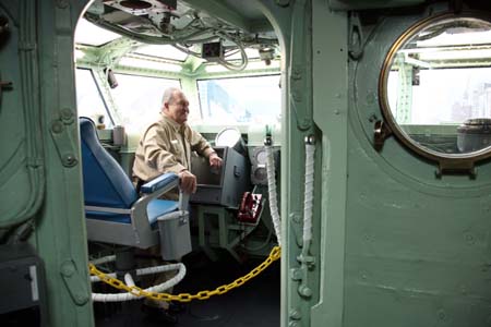 A former crew member visits the newly renovated Intrepid Sea, Air and Space Museum at Pier 86 of Manhattan in New York, the United States, Nov. 8, 2008. The decommissioned USS aircraft carrier Intrepid reopened to the public after a two-year overhaul on Saturday. Opened in 1982, the Museum has received more than 10 million visitors.[Hou Jun/Xinhua] 