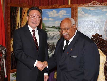 Wu Bangguo (L), chairman of the Standing Committee of China&apos;s National People&apos;s Congress(NPC), the country&apos;s top legislature, shakes hands with Ethiopian President Girma Wolde Giorgis (R) in Addis Ababa, capital of Ethiopia, on Nov. 10, 2008.