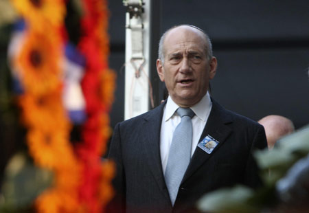 Israel&apos;s Prime Minister Ehud Olmert speaks during the annual memorial ceremony for former Israeli prime minister Yitzhak Rabin, who was killed by an ultranationalist Jew in 1995, at the Mount Herzl cemetery in Jerusalem Nov. 10, 2008. [Xinhua/Reuters]