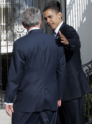 US President George W. Bush greets President-elect Barack Obama as he arrives at the White House in Washington, November 10, 2008. [Agencies] 