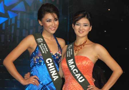 Miss China Zhou Yingkun and Miss Macao Qian Wei Na attend the Miss Earth 2008 beauty pageant in Angeles City of Pampanga, north of Manila, Philippines, November 9, 2008. Eight-five beauties from all over the world attended the contest and Miss Philippines Karla Paula Henry won the title of Miss Earth.