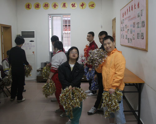 People with intellectual disabilities rehearse a program at a training centre at the Fengyuan Street residential area in Guangzhou on Monday, November 10th, 2008. 