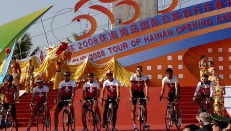  Members of Swiss team perform at the opening ceremony of the 2008 International Road Cycling Race around Hainan Island in Sanya of south China's Hainan Province, Nov. 11, 2008. [Xinhua]