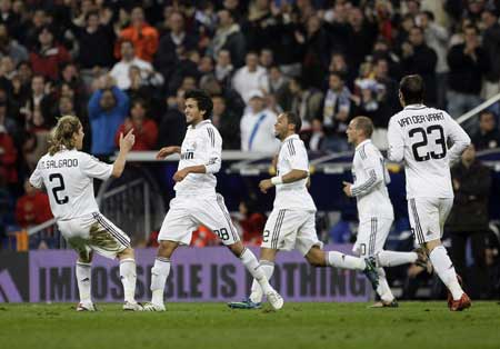 Real Madrid's Alberto Bueno (2nd L) celebrates a goal with team mates during their Spanish King's Cup soccer match against Real Union Club at the Santiago Bernabeu stadium in Madrid Nov. 11, 2008. [Xinhua/Reuters] 