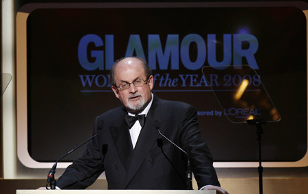 Author Salman Rushdie presents a Glamour Woman of the Year award from Glamour magazine in New York Nov. 10, 2008. 