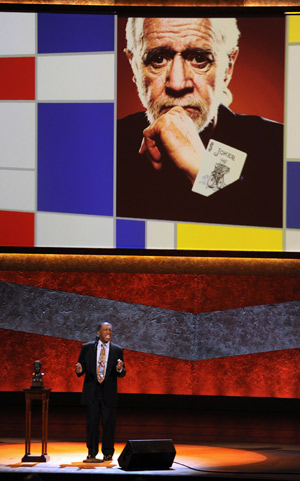 Singer Ben E. King sings his hit song "Stand By Me" onstage at the conclusion of a tribute to late stand-up comedian George Carlin at the Kennedy Center