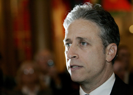 Comedian Jon Stewart talks to reporters about late stand-up comedian George Carlin as he arrives for a gala honoring Carlin as the recipient of the 11th Annual Mark Twain Prize for American Humor at the Kennedy Center 