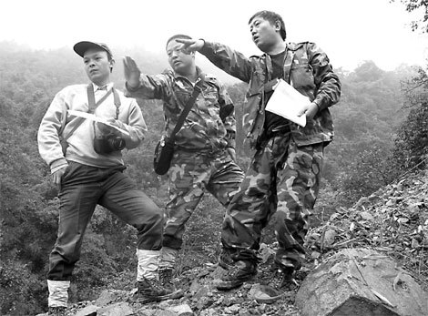 Jiang Zhongjuan (center) and his fellow rangers on a panda survey at Longxi-Hongkou nature reserve in Sichuan Province.