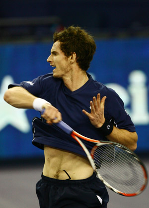 Andy Murray of Great Britain returns the ball during the men's singles competition against Gilles Simon of France at Tennis Masters Cup Shanghai, 2008, in Shanghai, east China, Nov. 12, 2008. [Xinhua]