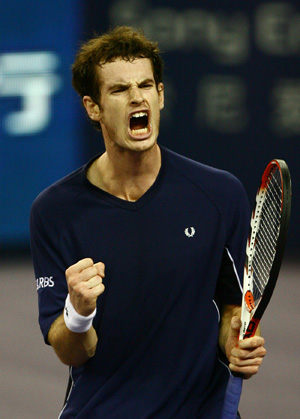  Andy Murray of Great Britain jubilates after scoring against Gilles Simon of France during the men's singles competition at Tennis Masters Cup Shanghai, 2008, in Shanghai, east China, Nov. 12, 2008.[Xinhua]