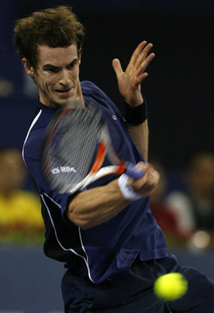 Andy Murray of Great Britain acts against Gilles Simon of France during the men's singles competition against at Tennis Masters Cup Shanghai, 2008, in Shanghai, east China, Nov. 12, 2008.