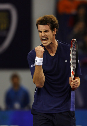 Andy Murray of Great Britain jubilates after scoring against Gilles Simon of France during the men's singles competition against at Tennis Masters Cup Shanghai, 2008, in Shanghai, east China, Nov. 12, 2008. 