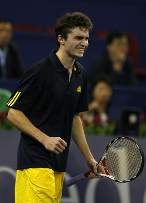 Gilles Simon of France reacts during the men's singles competition against Andy Murray of Great Britain at Tennis Masters Cup Shanghai, 2008, in Shanghai, east China, Nov. 12, 2008. 