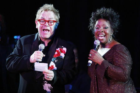 Singer Elton John and Gladys Knight perform during a benefit for the Elton John AIDS foundation in New York November 11, 2008.