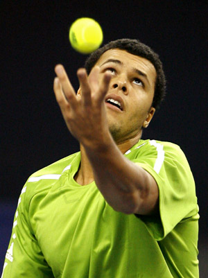 French player Jo-Wilfried Tsonga serves against Serbia's Novak Djokovic during the men's singles competition at Tennis Masters Cup Shanghai, 2008, in Shanghai, east China, Nov. 13, 2008. [Xinhua]