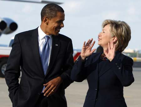 US Democratic presidential nominee Senator Barack Obama (D-IL) and Senator Hillary Clinton (D-NY) step off the campaign plane in Orlando, Florida, October 20, 2008.