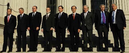 Group of Seven central bank governors pose for a group photo after their meeting at the Treasury Department in Washington, the Unuted States, October 10, 2008. 