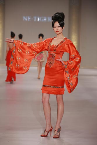 A model presents a creation of NE • TIGER, China's leading luxury brand during the Opening Show of China Fashion Week for the seventh successive year. On November 5, 2008. 