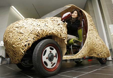 'Bamgoo', an electric car with a body made out of bamboo, is displayed in Kyoto, western Japan November 14, 2008. The sixty-kilogram single-seater ecologically friendly concept car, which measures 270 centimeters in length, 130 centimeters in width and 165 centimeters in height, is developed by Kyoto University Venture Business Laboratory, featuring bamboo articles in the Kyoto area. The car can run for 50 kilometers on a single charge. 