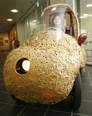 'Bamgoo', an electric car with a body made out of bamboo, is displayed in Kyoto, western Japan November 14, 2008. The sixty-kilogram single-seater ecologically friendly concept car, which measures 270 centimeters in length, 130 centimeters in width and 165 centimeters in height, is developed by Kyoto University Venture Business Laboratory, featuring bamboo articles in the Kyoto area. The car can run for 50 kilometers on a single charge. 