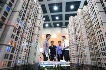 Officials say building of more than 400,000 low-rent housing units is expected to start before the end of the year. 