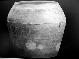 A sacrificial utensil unearthed near the site of Qin 'Xing Tai'; the white spots on the jar are believed to represent the movements of the stars.