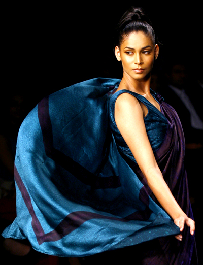 A model presents a creation by Indian designer Rohit Bal during a fashion show at the 'Chivas in Fashion Tour 08' in New Delhi November 16, 2008.