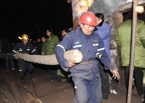 Rescuers race against time to search and rescue miners trapped in a flooded Gaomendong coal mineons, Pingdingshan City, Central China's Henan Province, November 17, 2008. 34 people were trapped in this coal mine that flooded early Monday morning. 