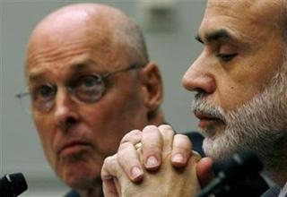 Treasury Secretary Henry Paulson and Federal Reserve Chairman Ben Bernanke testify at the House Financial Services Committee, November 18, 2008. [Kevin Lamarque/Reuters]