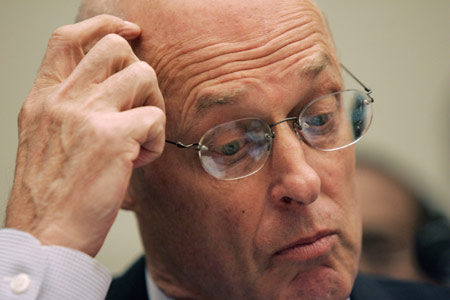 U.S. Treasury Secretary Henry Paulson pauses while testifying before the House Financial Services Committee in a hearing on 'Oversight of Implementation of the Emergency Economic Stabilization Act of 2008 and Government Lending and Insurance Facilities; Impact on Economy and Credit Availability' on Capitol Hill in Washington November 18, 2008. 