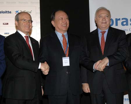 Spanish Foreign Minister Miguel Angel Moratinos, Chairman of the China Federation of Industrial Economics Xu Kuangdi and Minister of Industry Miguel Sebastian(R to L) attend the opening ceremony of Global China Business Meeting in Barcelona, Spain, Nov. 17, 2008. The annual Global China Business Meeting opened on Monday to discuss how Chinese companies can help ward off a global recession amidst the current international financial crisis.