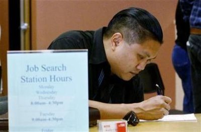 Joseph Sullivan fills out a form at the Verdugo Jobs Center, a partnership with the California Employment Development Department, in Glendale, California November 7, 2008.