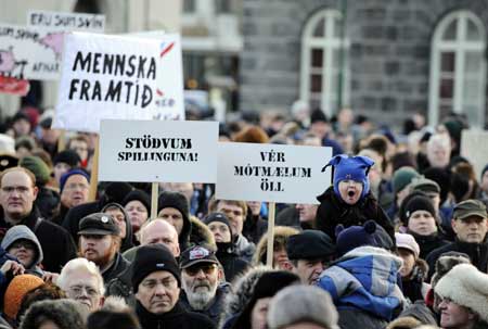 Thousands of demonstrators take part in a rally in Reykjavik, capital of Iceland, calling on the government to resign for the national financial crisis, Nov. 15, 2008. Iceland's central bank has raised its benchmark interest rate to 18% after the government took control of the three largest banks, however, the Icelandic economy remain in unprecedented turbulence, due to the lack of international aid loans and public confidence, and trade shrinking. 