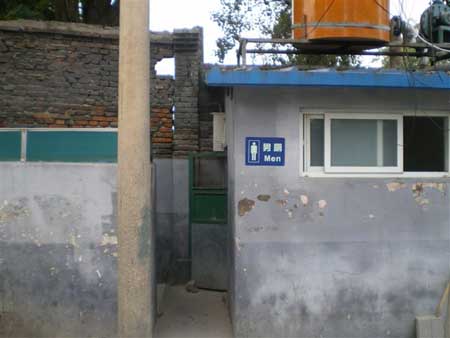 Although the sign is in English, the chemical toilets to be seen all over the Hutong areas are not there for the convenience of passing tourists.